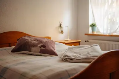 Ein Bett oder Betten in einem Zimmer der Unterkunft Feriendomizil Tippe
