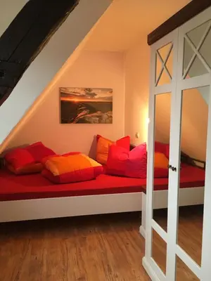 Ein Bett oder Betten in einem Zimmer der Unterkunft Ferienhaus Harzinsel