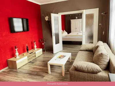 Ein Bett oder Betten in einem Zimmer der Unterkunft Trattoria & Apartments - Casa da Enzo