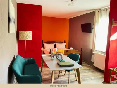 Ein Sitzbereich in der Unterkunft Trattoria & Apartments - Casa da Enzo