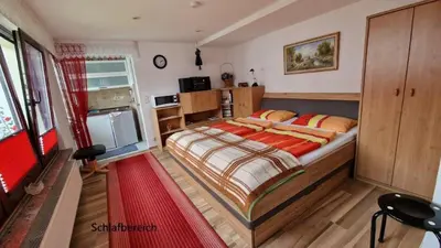 Ein Bett oder Betten in einem Zimmer der Unterkunft Ferienhaus Gleesner