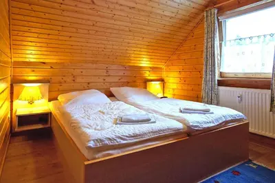 Ein Bett oder Betten in einem Zimmer der Unterkunft Ferienhaus in Hasselfelde