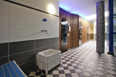 Ein Badezimmer in der Unterkunft Ferienhäuser im Tannenpark, Tanne