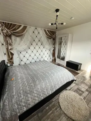 Ein Bett oder Betten in einem Zimmer der Unterkunft Ferienwohnung Santino