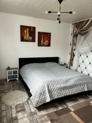 Ein Bett oder Betten in einem Zimmer der Unterkunft Ferienwohnung Santino