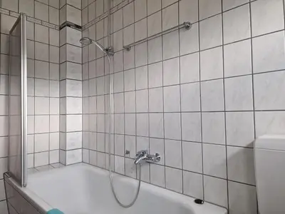 Ein Badezimmer in der Unterkunft Ferienwohnung Vier Sterne