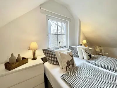 Ein Bett oder Betten in einem Zimmer der Unterkunft GUGLHUPF Wohlfühl-Maisonette mit Boxspring, NETFLIX, Fahrstuhl