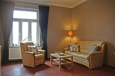 Ein Sitzbereich in der Unterkunft Ferienwohnung mit Brockenblick Ginko