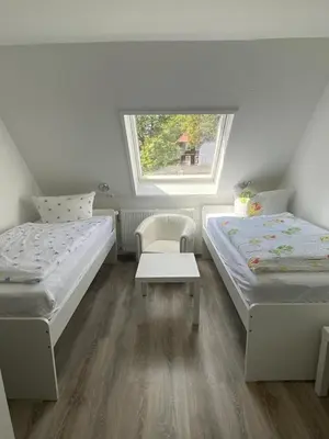 Ein Bett oder Betten in einem Zimmer der Unterkunft Hotel Braunlage