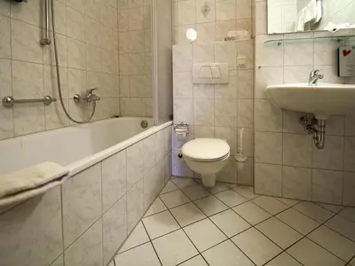 Ein Badezimmer in der Unterkunft Apartment in fir with a balcony or a terrace