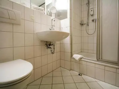 Ein Badezimmer in der Unterkunft Wohnung in Tanne mit einem gemeinsamen Pool