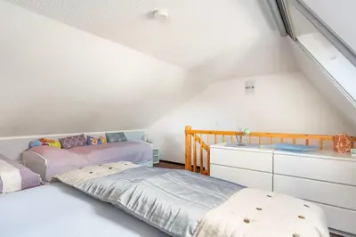 Ein Bett oder Betten in einem Zimmer der Unterkunft Ferienhaus am Osterberg