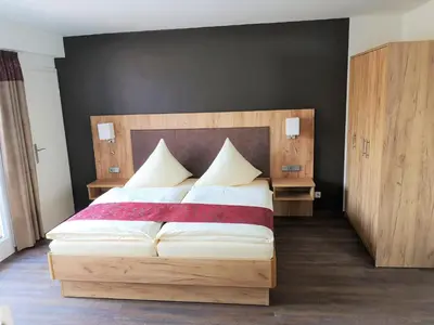 Ein Bett oder Betten in einem Zimmer der Unterkunft Feriendomizil Schlossblick