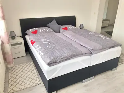 Ein Bett oder Betten in einem Zimmer der Unterkunft FeWo Altstadt - Mitten im Herz Goslar
