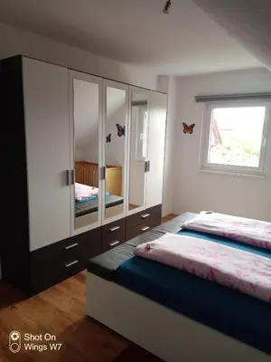 Ein Bett oder Betten in einem Zimmer der Unterkunft Ferienhaus Mina im Harz