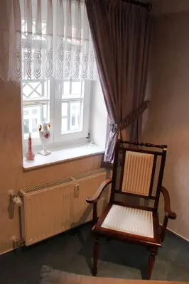 Ein Sitzbereich in der Unterkunft Puppenstübchen