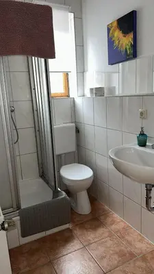 Ein Badezimmer in der Unterkunft Art Apartment - Harz