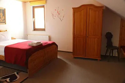 Ein Bett oder Betten in einem Zimmer der Unterkunft Sternhaus-Harz
