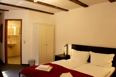 Ein Bett oder Betten in einem Zimmer der Unterkunft Sternhaus-Harz
