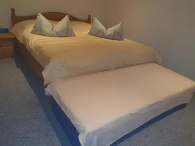Ein Bett oder Betten in einem Zimmer der Unterkunft Fuchsbaude