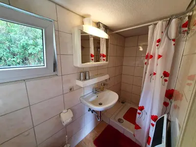 Ein Badezimmer in der Unterkunft Ferienhaus 