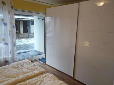 Ein Bett oder Betten in einem Zimmer der Unterkunft Ferienwohnung Waldkauz