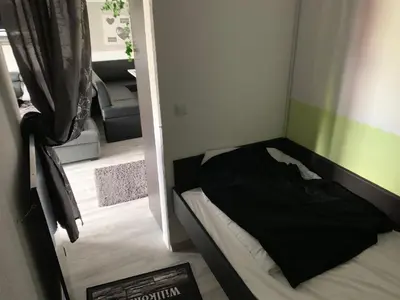 Ein Bett oder Betten in einem Zimmer der Unterkunft Hahnenklee Ferienpark 6-244