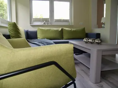 Ein Sitzbereich in der Unterkunft Forest-Fringed Comfort