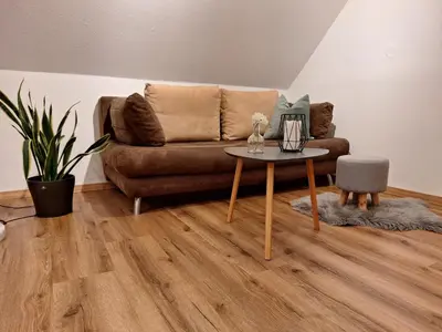 Ein Sitzbereich in der Unterkunft Ferienwohnung am Kurpark in Zorge im Harz