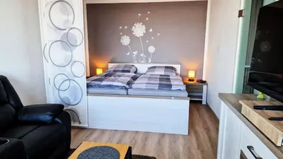Ein Bett oder Betten in einem Zimmer der Unterkunft Harztraum
