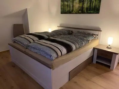 Ein Bett oder Betten in einem Zimmer der Unterkunft Ferienhaus Lilo