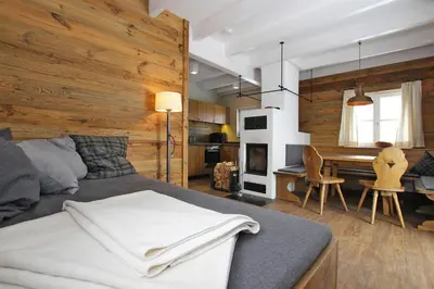 Ein Sitzbereich in der Unterkunft Ferienhäuser im Torfhaus Harzresort, Torfhaus