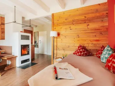 Ein Sitzbereich in der Unterkunft Ferienhäuser im Torfhaus Harzresort, Torfhaus