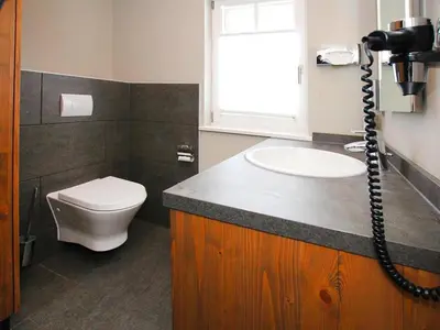 Ein Badezimmer in der Unterkunft Holiday homes in Torfhaus Harzresort, Torfhaus