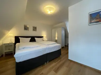 Ein Bett oder Betten in einem Zimmer der Unterkunft Apartment mit Balkon No4