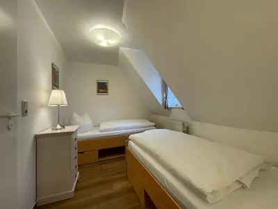 Ein Bett oder Betten in einem Zimmer der Unterkunft Apartment mit Balkon No4