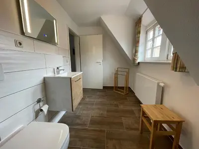 Ein Badezimmer in der Unterkunft Apartment mit Balkon No5