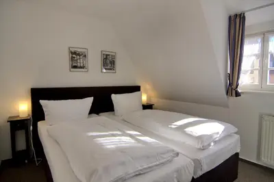 Ein Bett oder Betten in einem Zimmer der Unterkunft Apartment mit Balkon No5