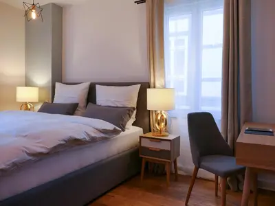 Ein Bett oder Betten in einem Zimmer der Unterkunft Boutique-Hotel Anno 1910
