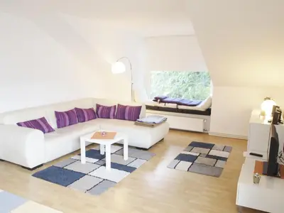 Ein Sitzbereich in der Unterkunft Ferienwohnung Bummelallee