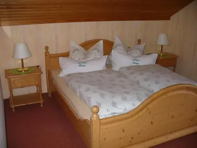 Ein Bett oder Betten in einem Zimmer der Unterkunft Landhaus Kathrin