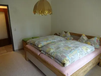 Ein Bett oder Betten in einem Zimmer der Unterkunft Ferienwohnung Kurparkblick