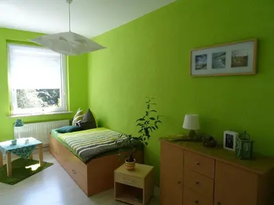 Ein Bett oder Betten in einem Zimmer der Unterkunft Ferienwohnung Kerstin