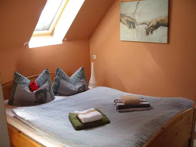 Ein Bett oder Betten in einem Zimmer der Unterkunft Villa Regina