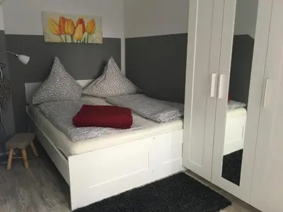 Ein Bett oder Betten in einem Zimmer der Unterkunft Apartments Gosch Braunlage