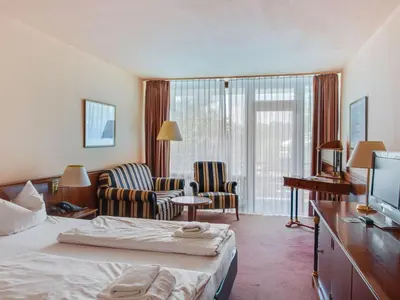 Ein Bett oder Betten in einem Zimmer der Unterkunft Wohnung am See in Hahnenklee