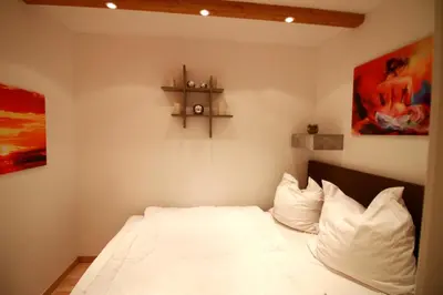 Ein Bett oder Betten in einem Zimmer der Unterkunft App 622 Panoramic Hohegeiß mit WLan Terrassenhaus
