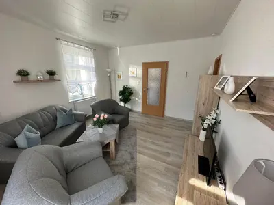 Ein Sitzbereich in der Unterkunft Ferienwohnung Hosang
