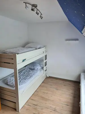 Ein Bett oder Betten in einem Zimmer der Unterkunft Traumharz