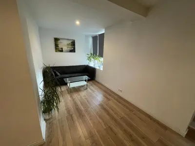 Ein Bett oder Betten in einem Zimmer der Unterkunft Ferienwohnung Wasserkunst